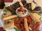 An appetizer tray of Nicoise (neese-waas) specialties (traditional food from the region)
