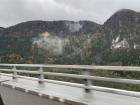 That's not smoke: those are clouds starting to form in the mountains of Switzerland