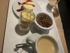 Mini dessert platter featuring (top to bottom) cheesecake, tiramisu, chocolate mousse and an espresso