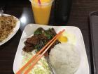 Spicy beef with a side of rice and cabbage--I also ordered mango and lime juice!