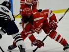 About to take a face-off during a hockey game, playing for St Paul's School in Concord, New Hampshire