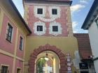 A gate in Český Krumlov that now leads to the highway and marks the end of Old Town