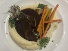 Beef cheeks in a wine sauce with mashed potatoes