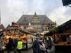 The Christmas market in Bremen's main square, with sweet treats and beeswax candles for sale