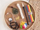 Some choices for the baby... here are typical gifts such as a paint brush and money, and an unusual one such as a stethoscope
