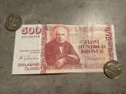 500 krónur bill and 100 króna coins (front and back)