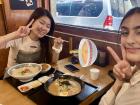 My friend Cally and me eating Korean-style ramen