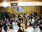 Can you spot me with the bunny ears peace signs at this K-pop noraebang party?