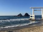 A picture of the shrine, rocks, and Torii gate without me