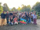 Posing with the Mapuche flag during a visit to the Melo community with a group of U.S. students 