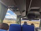 A bus trip in the Río Negro province of Argentina; Can you spot the mountains out the window?