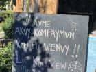 A sign in Mapuzugun welcomes visitors to the Mapuche Kinxikew community