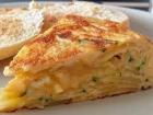 A Spanish tortilla, full of eggs and potatoes 