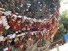 Worshippers' wishes for love, happiness and wealth hang outside the temple