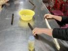 Rolling the scallions into the dough