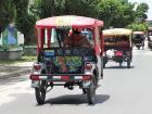 Many tuk tuk drivers like to dedicate their vehicles to passed family members, saints or their children, and that’s why you might see written names on the back of some tuk tuks
