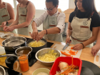 Chopping veggies while the potatoes and onions boil for our tortilla de patata (Spanish omelette)!