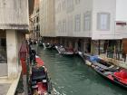 A street canal in Venice, filled with gorgeous gondolas!