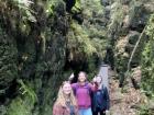 My friends and I in a canyon between two sandstone mountains