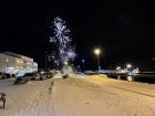 Fireworks are set off in the streets around Ísafjörður