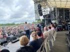 Prime Minister Chris Hipkins giving a speech in front of audience