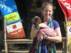 Holding a baby sweatered goat in Bangladesh - the first one I ever saw!