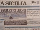 The front page of the newspaper; roughly translated "Vite Sospese" means "lives suspended," referring to those stuck on the ship