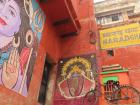 Hindu murals and a bicycle in Varanasi, India