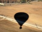 Here is a photo from my hot air balloon ride; it shows the shadow of the balloon as it's flying