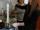 Me helping my host stir the elarji, a dish made with cornmeal and lots of stretchy sulguni cheese!
