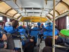 Volunteers taking the shuttle... check out our matching jackets!