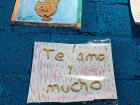 The sign in the restaurant, "Te amo y mucho", means "I love you a lot"