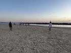 Playing soccer with Josh and meeting a new friend on the beach