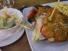 Kartoffelburger with Pommes (french fries) and Salat (salad)