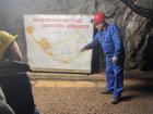 Our tour guide in the mine explaining the layout underground