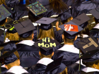 Some people have started decorating their hats in the U.S., as well, but they usually do not put as many three-dimensional objects on their hats