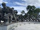 This statue is from the War Memorial in Korea and it displays the soldiers during the war leading civilians through the battlefield