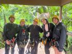 Here I am with friends, just after finishing our zipline activity; it was so much fun!
