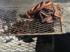Beef cooking on the grill at a barbecue for the Independence Day of Botswana