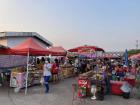 Another view of the fresh market in Nadoon, depicting lots of vendors selling many different types of food