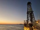 Our third drilling site at sunset; You can see our big drilling derrick, too