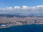 The view of Barcelona by plane; if you look closely, you can spot the Sagrada Familia from a distance