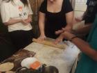 Here I am rolling out the dough of the empanadas to shape them into circles