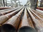 10 meter sections of drill pipe, laid flat for transport