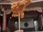 This is a chicken nugget from Monga which is supposed to be eaten with a stick like this