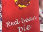 A red bean pie pet toy that I bought for a neighborhood dog