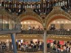 The "Galeries Lafayette" is a big mall in Paris that sells many luxury brands like Dior, Chanel and Louis Vuitton