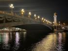 Just like the Eiffel Tower, the bridges over the Seine are lit up at night