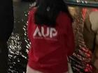 Sera wears the hoodie from our school - AUP