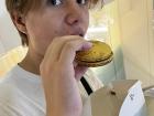 My friend is eating a passionfruit "macaron" from Pierre Herme